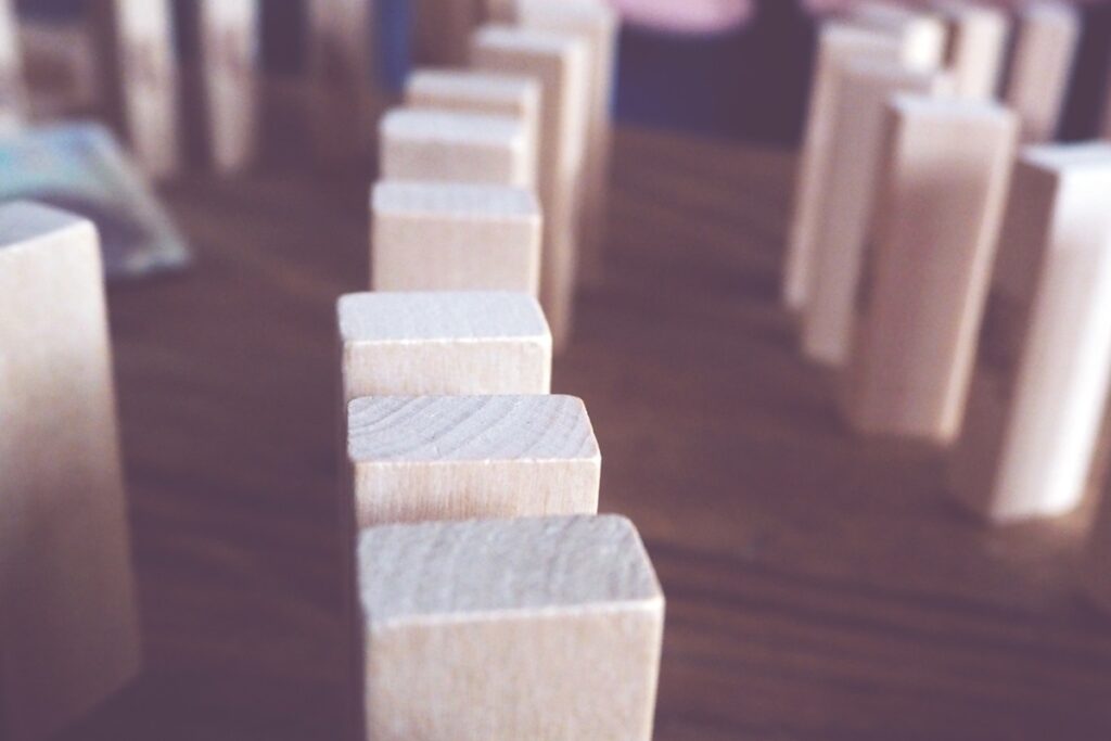 Wooden dominos stacked on a table