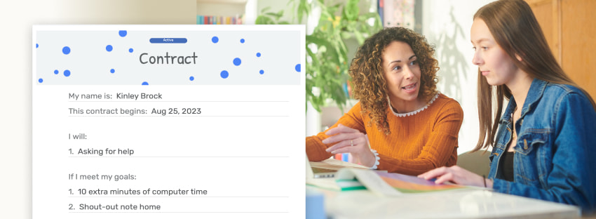 young student with teacher reviewing their behavior contract